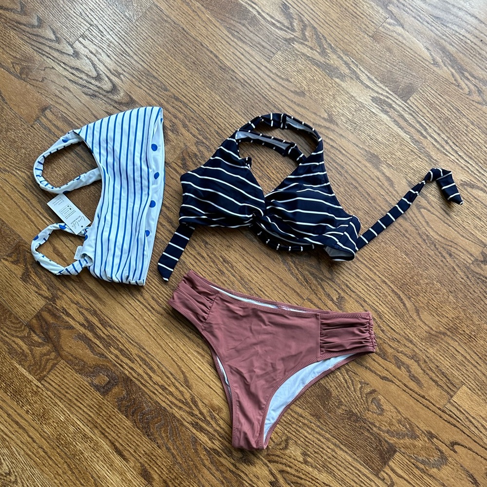 Blue and White Polka Dot and Striped Swimsuit Pieces.